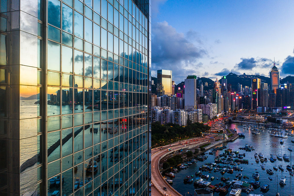 Image of glass building and city skyline