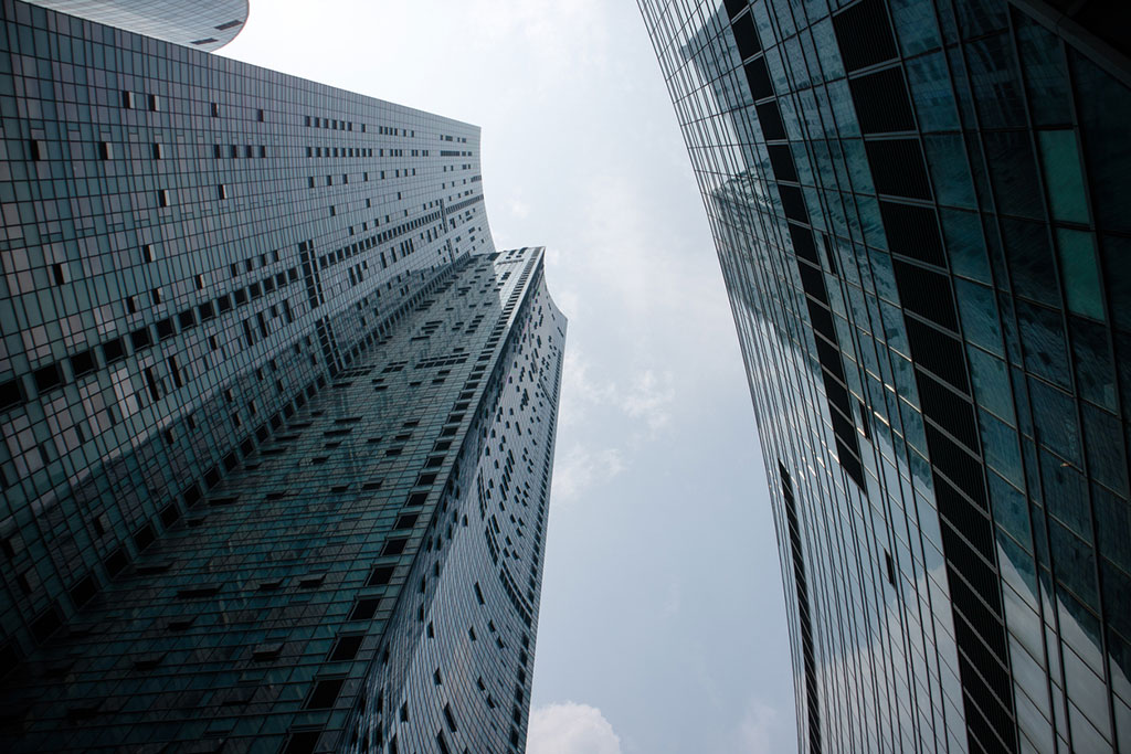 Looking up between two skyscrapers